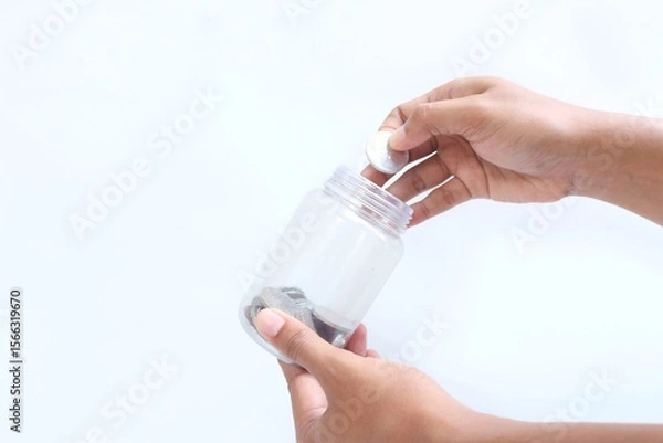 Fototapeta Saving money for the future. Saving money little by little