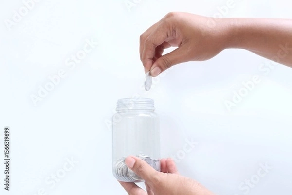 Fototapeta Saving money for the future. Saving money little by little