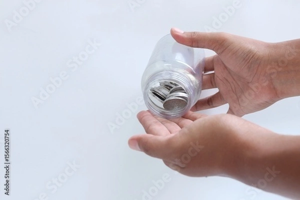 Fototapeta Saving money for the future. Saving money little by little