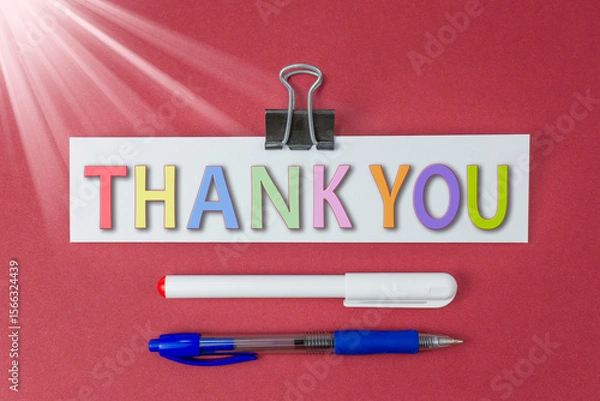 Fototapeta Thank you text on a red background