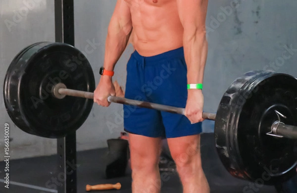 Obraz Shirtless Man Suring Weightlifting Session in Gym Focusing on Strength Training and Fitness