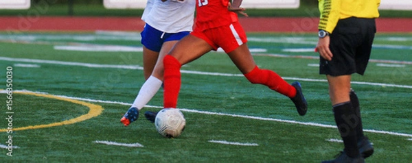 Obraz Exciting Soccer Match With Two Players Competing on the Field