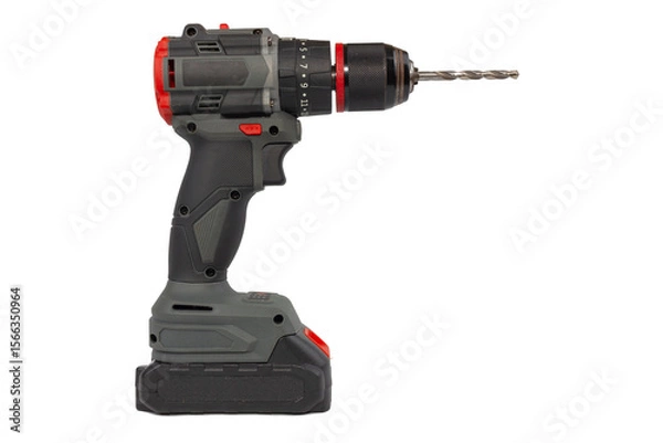 Fototapeta A cordless drill stands upright against a plain white background, showcasing its gray and black body, red accents, and a metal drill bit inserted into the chuck.