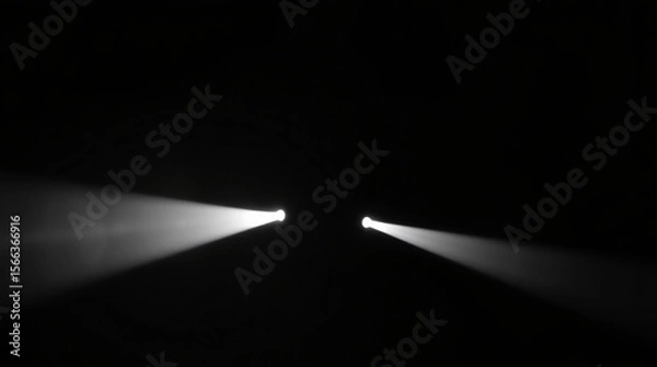 Fototapeta Beam of light in a dark tunnel, creating a dramatic and mysterious perspective.