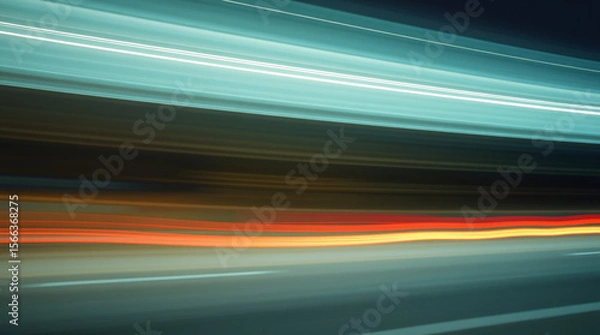 Fototapeta Abstract motion blur of colorful light trails showing dynamic speed and energy.