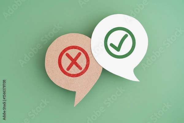 Fototapeta green true and red false mark on real speech bubble paper cut with green background. Concept of positive or negative decision making or choice of approval or rejection
