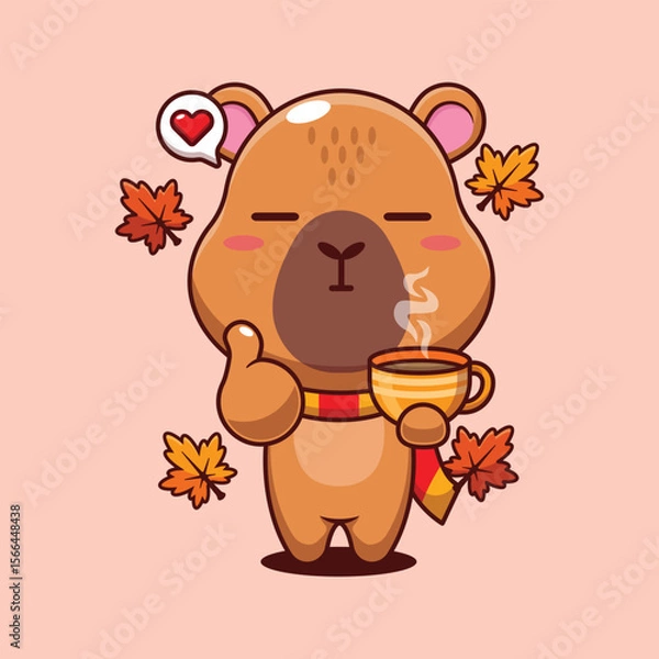 Fototapeta Cute capybara holding holding a cup of coffee in autumn day cartoon vector illustration