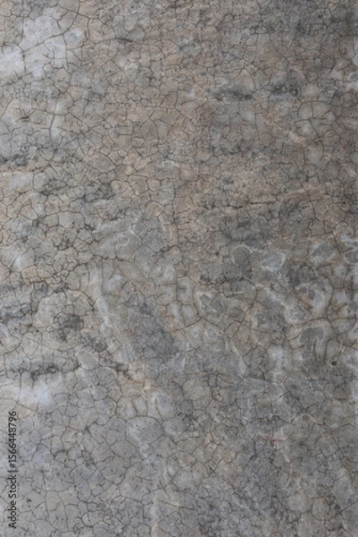 Fototapeta Close-up of Cracked and Weathered Concrete Surface