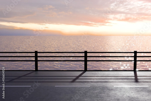 Obraz 夕日がキラキラ海面に反射するガードレールがある海沿いの道
