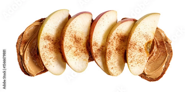 Fototapeta Delicious apple slices and peanut butter on whole wheat toast with cinnamon, a healthy and tasty snack for breakfast or anytime Concept of healthy eating and nutrition