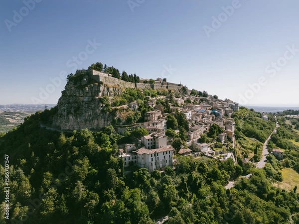 Fototapeta Italy, July 4, 2025: Aerial view, from the drone, of the medieval village of Civitella del Tronto, in the province of Teramo, in Abruzzo. Here you can breathe peace and tranquility and history.