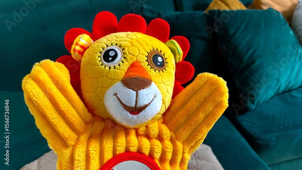 Obraz yellow puppet animal interactive toy hand little lion cub baby red