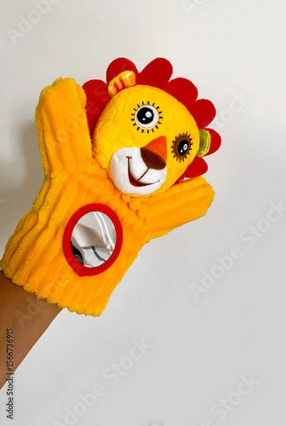 Obraz yellow puppet animal interactive toy hand little lion cub baby red