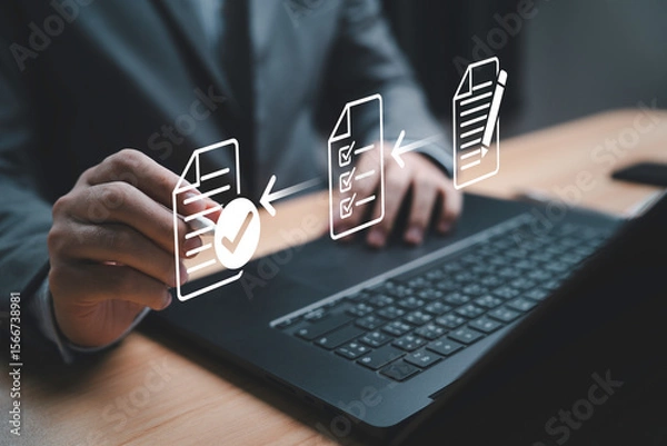 Fototapeta Businessman using electronic pen sign tick mark on virtual document for online approve paperless quality assurance and ERP management , Prepare check and approve document concept.