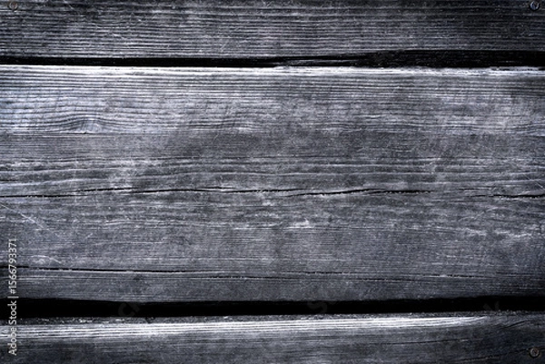 Fototapeta Natural wallpaper. Texture of old wood with cracks. Close-up. Selective focus.