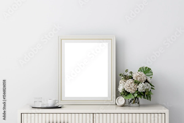 Fototapeta Elegant Empty Frame Mockup with Floral Arrangement