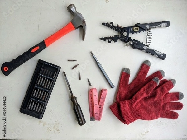 Fototapeta DIY tools and equipment organized in a knolling flat lay on a white background. Workshop, repair and home improvement concept.