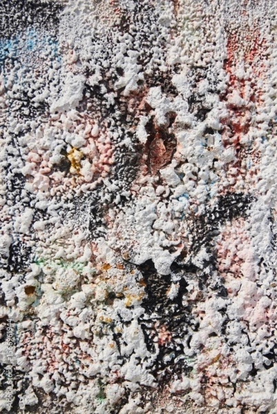 Fototapeta The plaster is applied to the wall in uneven layers. Smudges or splashes of paint