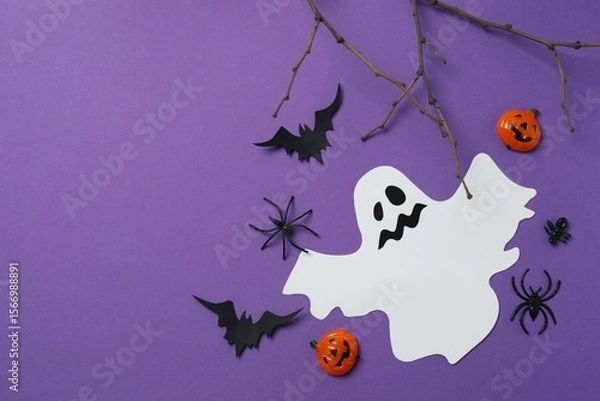 Fototapeta Halloween festive background design featuring bats, ghost, spiders and decorative branches