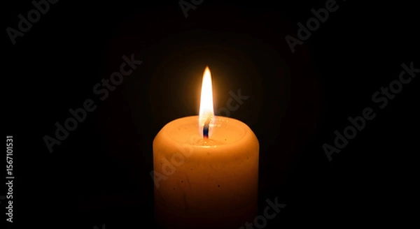 Obraz burning candle on a dark background