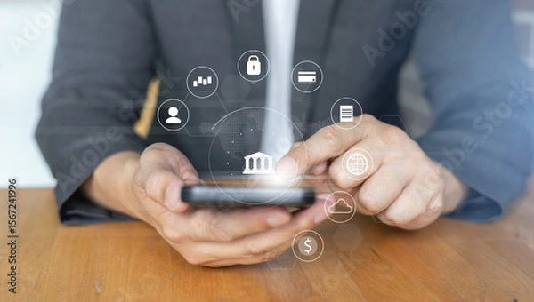 Fototapeta businessman hand hold smartphone and use private banking account application to using system function about checking stock market or transfer money worldwide for future tech concept
