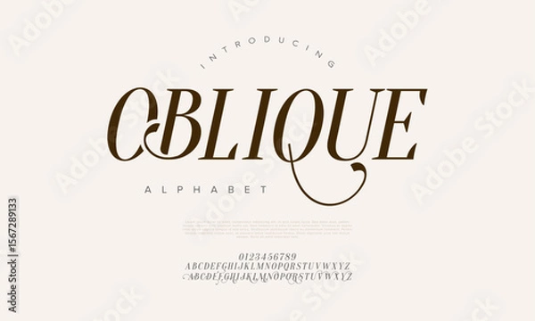 Fototapeta Serif font with calligraphic flair and graceful swashes, ideal for luxury branding and editorial design