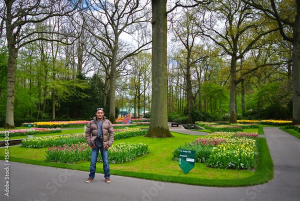 Fototapeta Photo of a man in the Keukenhof flower garden, Netherlands