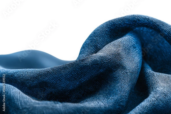 Fototapeta Textured fabric with deep blue hues drapes gracefully, creating a visually striking contrast.