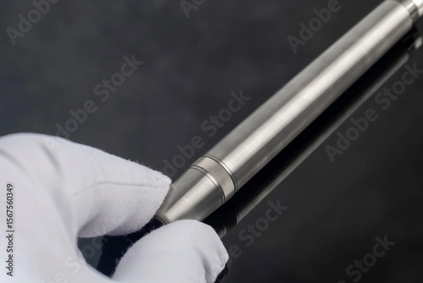 Obraz Fountain pen with box on dark gray background. Stationery branded items