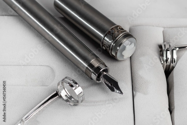 Obraz Fountain pen with box on dark gray background. Stationery branded items