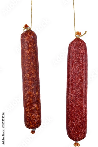 Obraz Two hanging raw smoked sausage isolated on white background