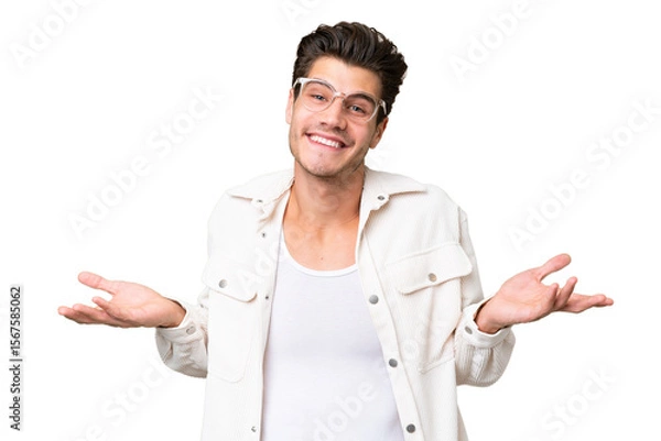 Fototapeta Young handsome caucasian man over isolated background happy and smiling