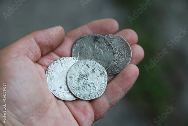 Fototapeta Huge medieval european silver coins in hand