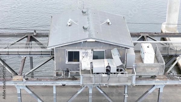 Fototapeta A stunning Aerial View of Pacific Highway Harwood Bridge crosses the Clarence River under a cloudy sky in the Northern Rivers region of New South Wales, Australia 