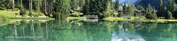 Fototapeta reflection in lake and mountains in gressoney italy 