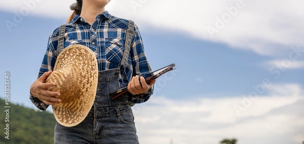 Fototapeta Young Person Enjoying Nature With a Notebook