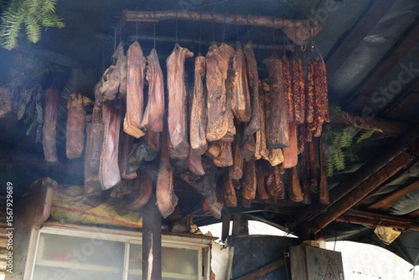 Obraz Smoked Meat from the Tujia Ethnic Minority in China with Subtle Flavor and Unique Smoky Aroma