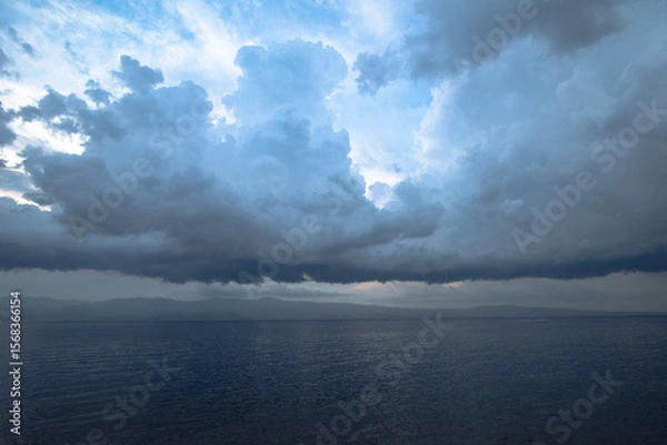 Obraz clouds over water