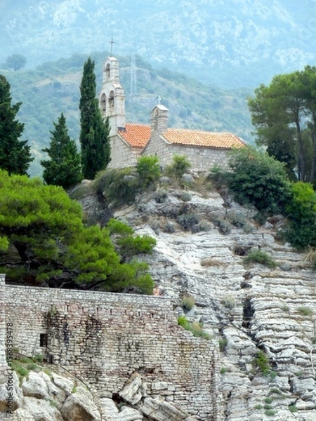 Fototapeta Stunning Seaside View of Sveti Stefan Island Resort in Montenegro Showcasing Historic Architecture