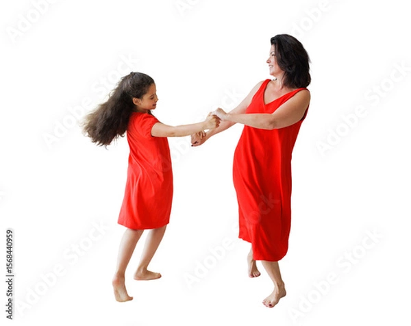 Fototapeta Celebrating joy and connection as a mother and daughter twirl in red dresses, transparent background