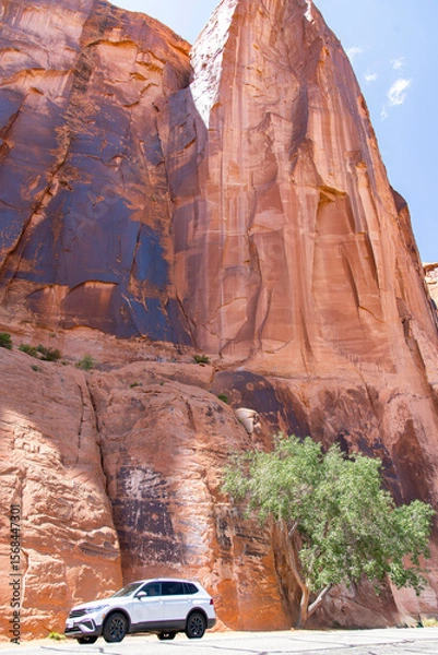 Fototapeta High canyon walls along the Potash Road along the Colorado River near Moab, Utah, USA known for the petroglyphs higher up on the cliff face