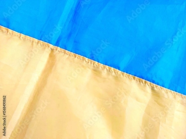 Fototapeta Ukrainian Flag Symbolizing Pride and Resilience Displayed in a Vibrant Setting During Daylight