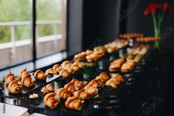 Fototapeta Elegant Buffet with Assorted Croissants Display