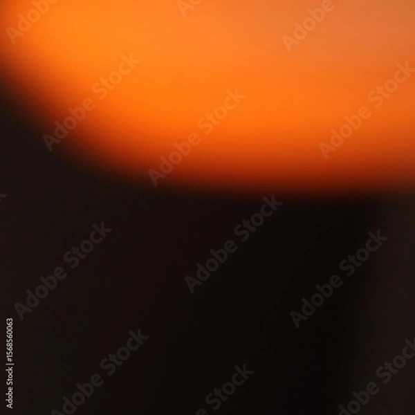 Fototapeta Real Camera-Captured Orange to Black Gradient Texture Background for Graphic Design