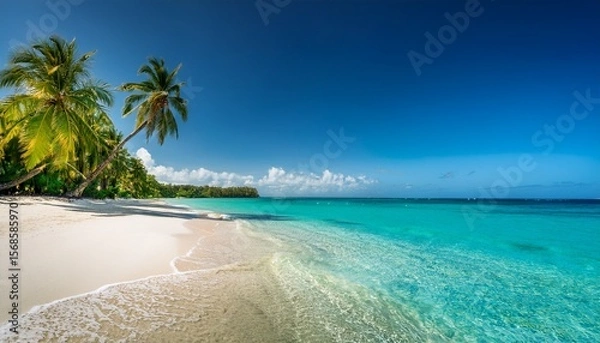 Fototapeta crystal clear ocean waves washing over a tropical white sand beach with tall palms swaying in the warm breeze