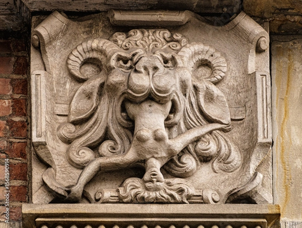 Obraz Medieval stone panel with lion and royal coat of arms