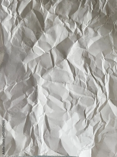 Obraz Wrinkled Paper Texture: Close-up of a textured, crumpled piece of paper, capturing the delicate folds and shadows creating a sense of history and depth.