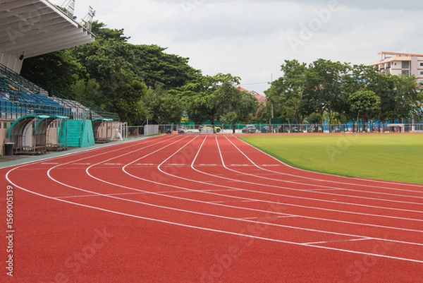 Obraz Red running track Synthetic rubber on the athletic stadium