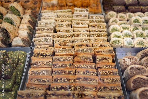 Fototapeta Colorful Array of Delights, Nuts, Pastry, and Syrup Sweets