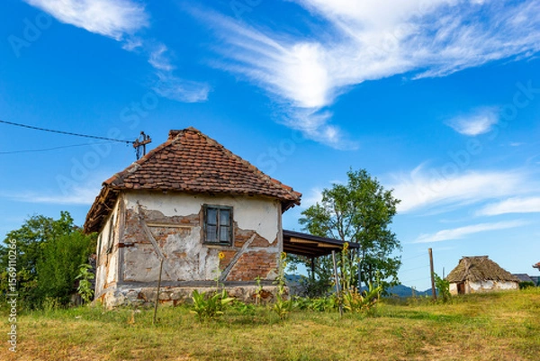 Fototapeta Old rural house in Serbia. Traditional Balkan countryside architecture.